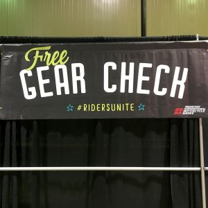 banner with pockets for pole or pipe to hang